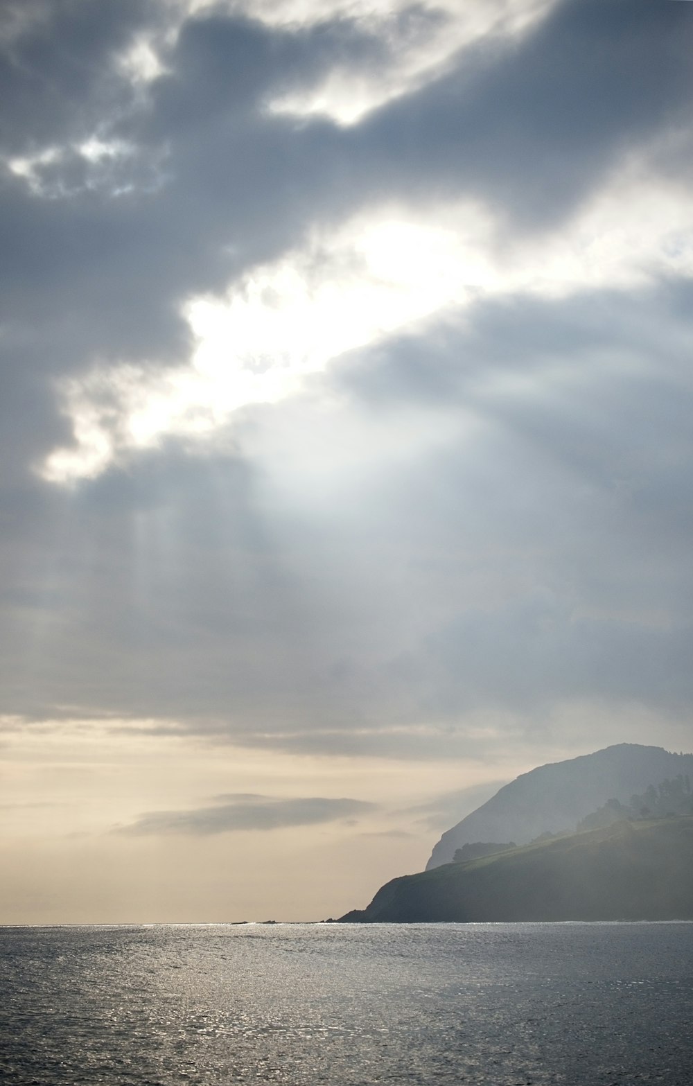 white clouds over the mountains