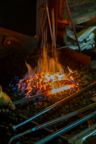Fragua con hierro caliente