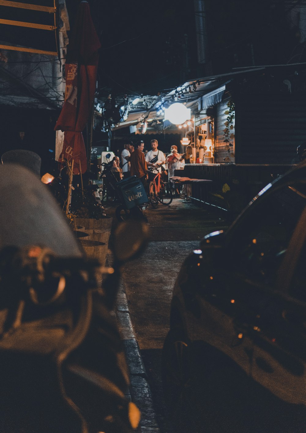 people walking on street during night time