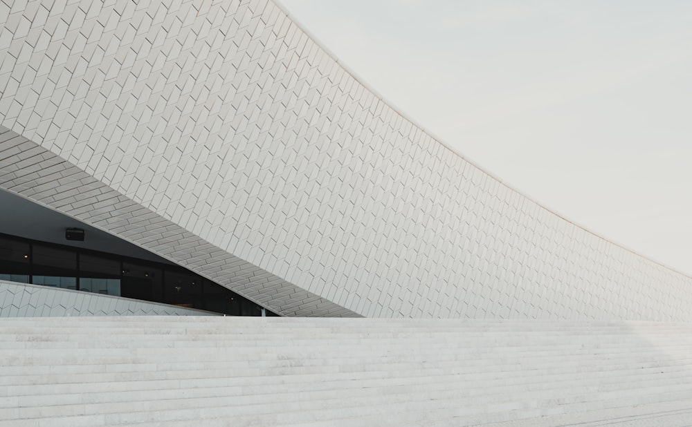 white concrete building under white sky during daytime