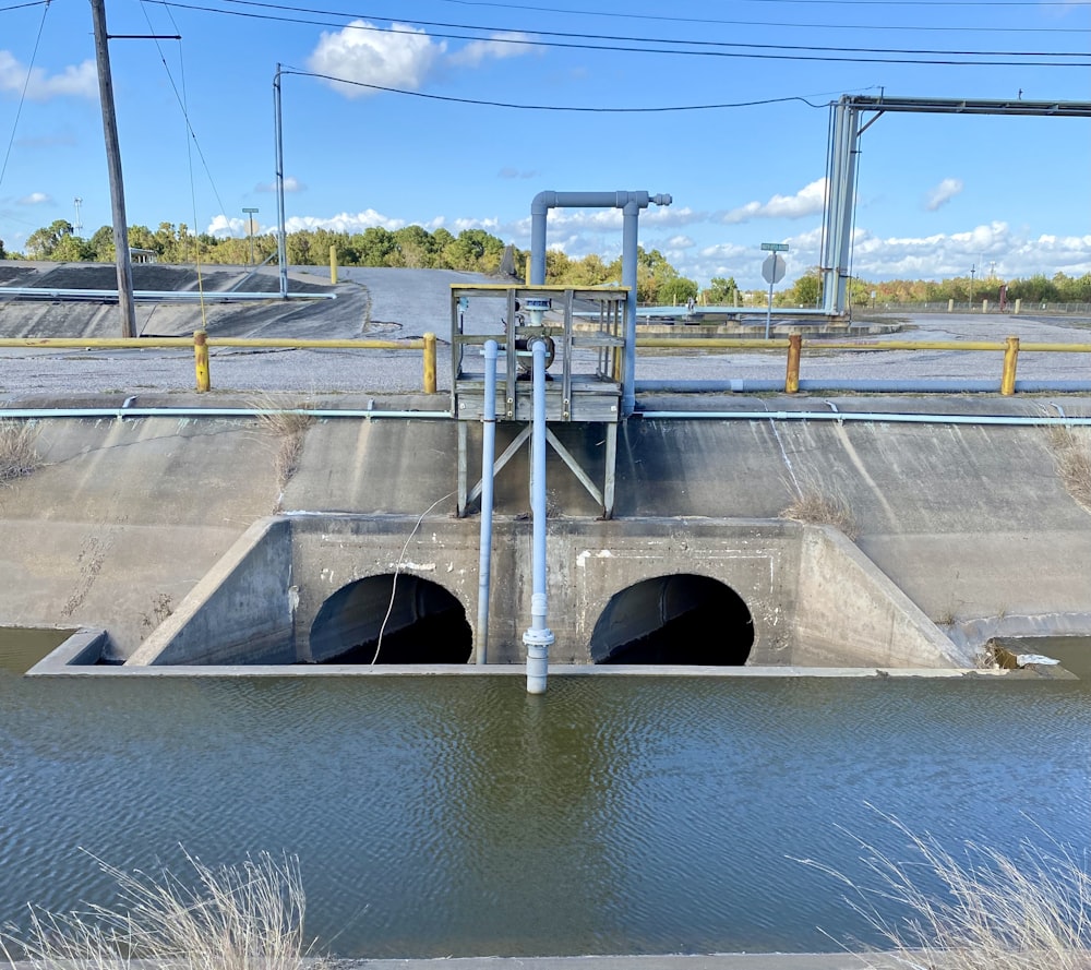 white concrete bridge over river during daytime