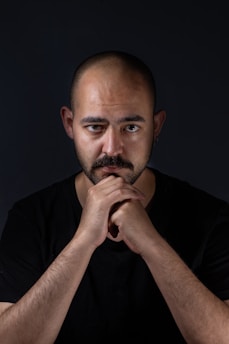 man in black crew neck shirt