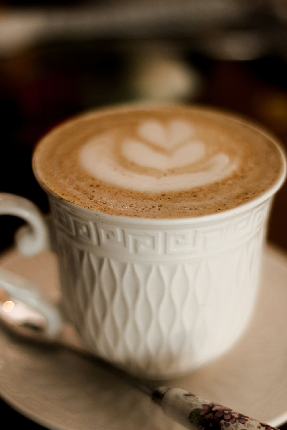 white ceramic mug with coffee