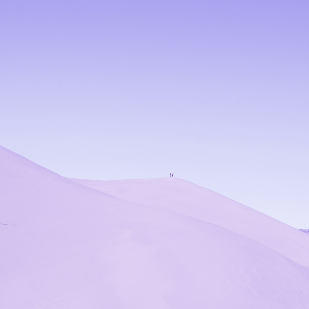 white sand under blue sky during daytime