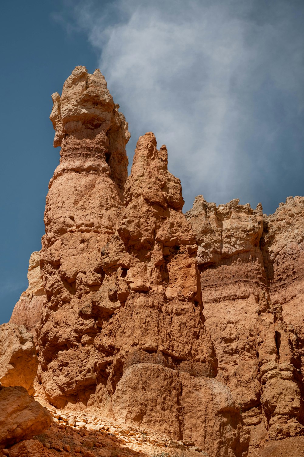 brown rock formation under blue sky during daytime