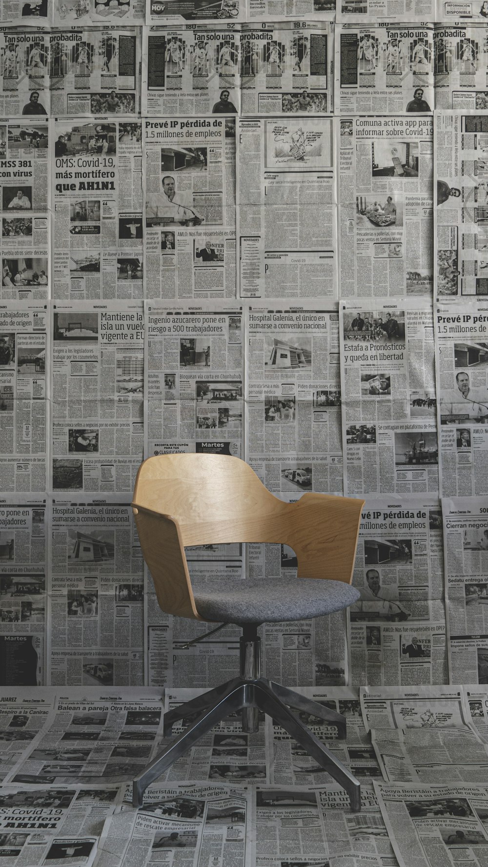 brown wooden chair on gray concrete floor