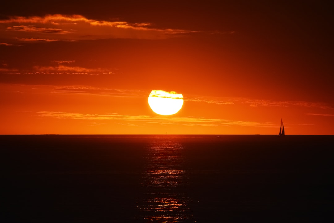 sunset over the sea with clouds