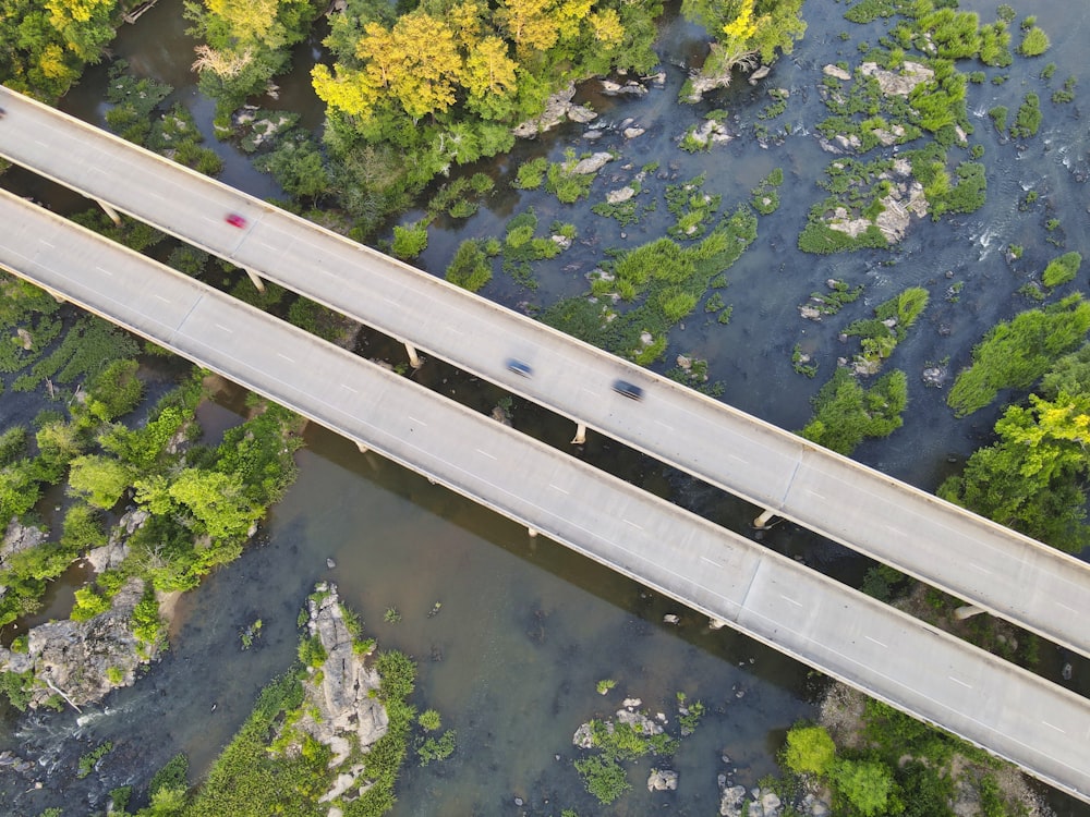 white metal bridge over river