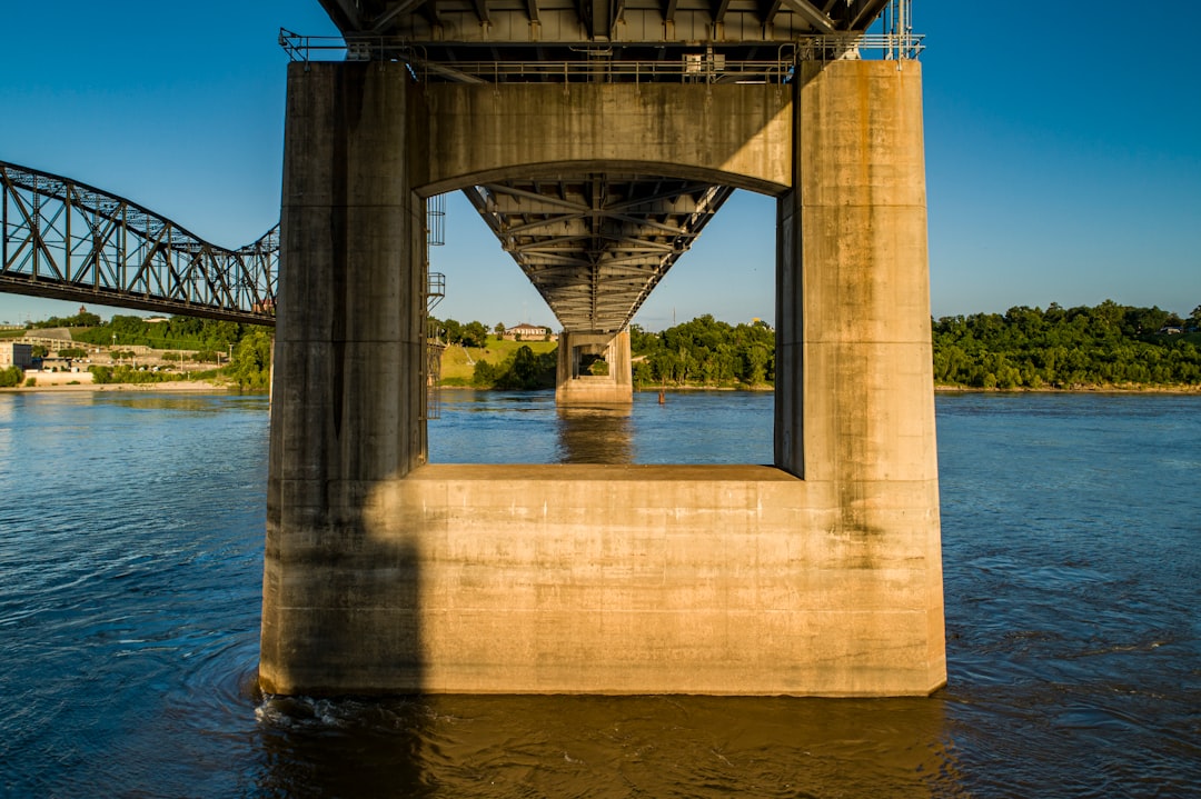 gray concrete bridge over water