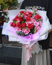 bouquet of red and pink roses
