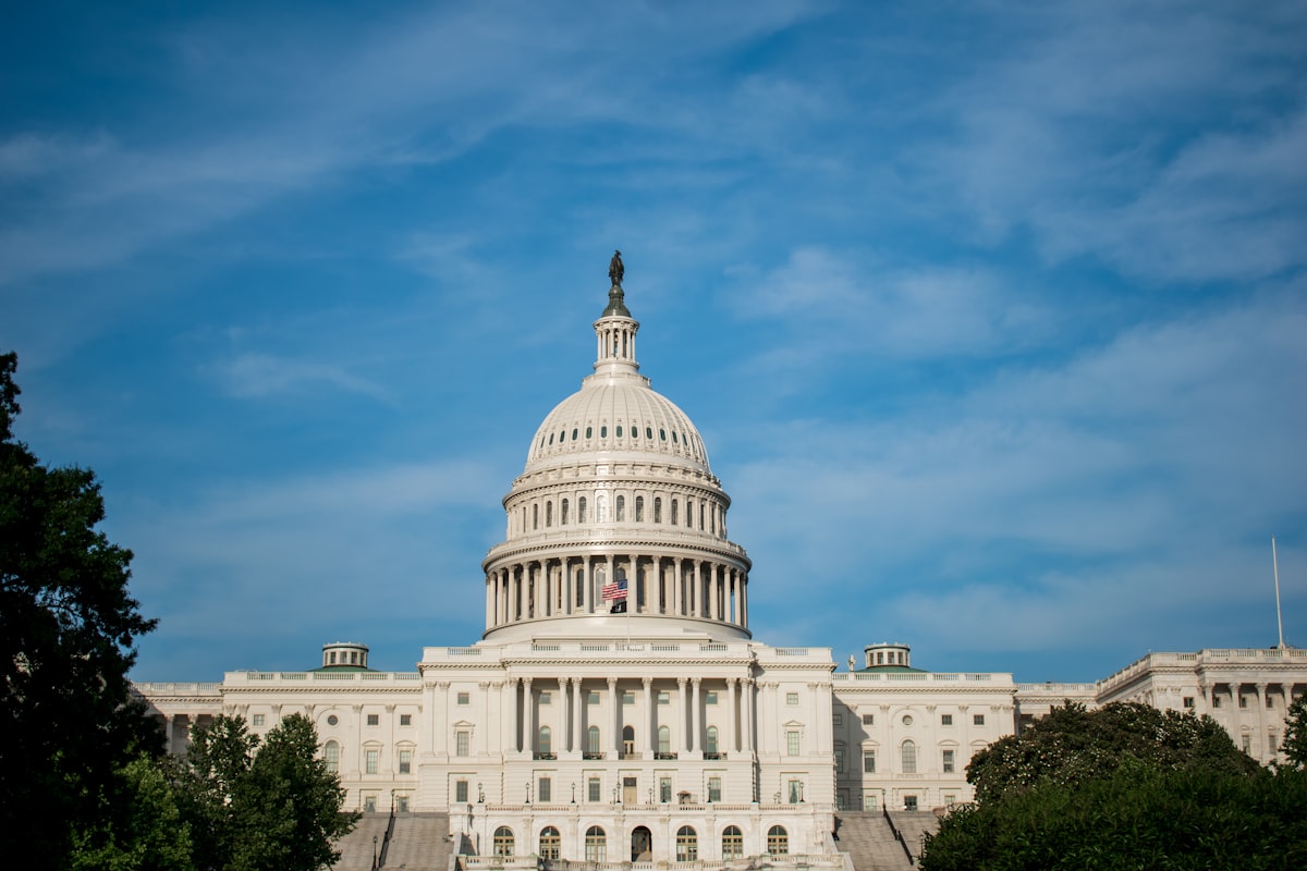 The U.S. Capitol building in Washington D.C. under a clear blue sky
