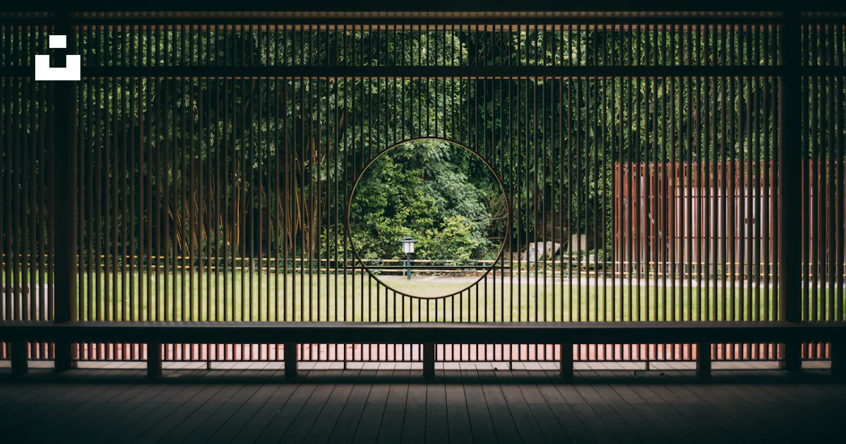 Black metal gate with lights turned on during night time photo – Free ...