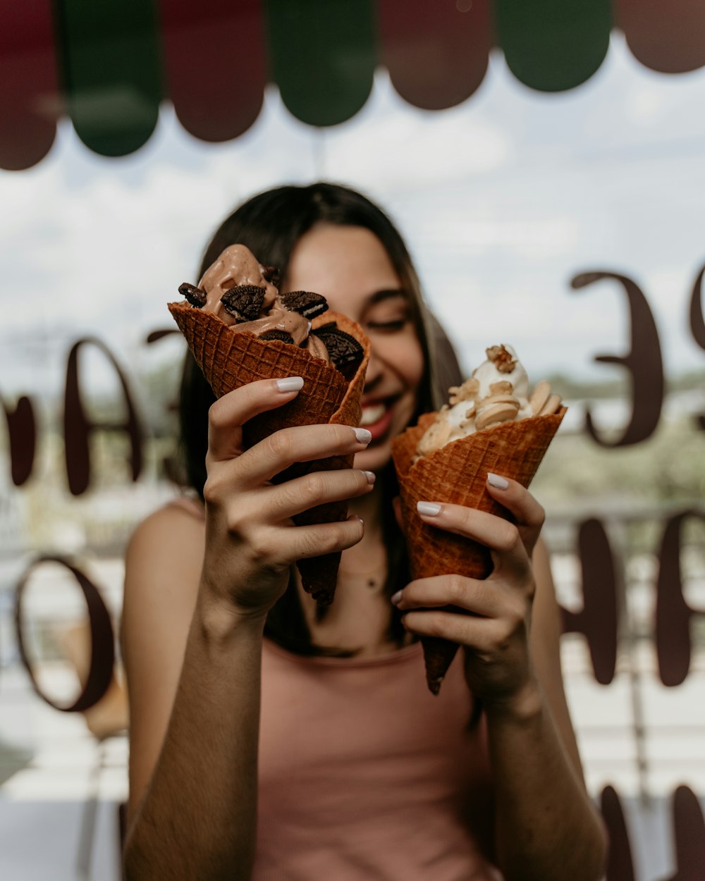 woman holding ice cream cone