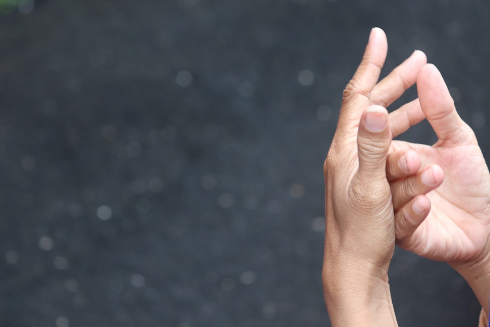 persons hand with white powder