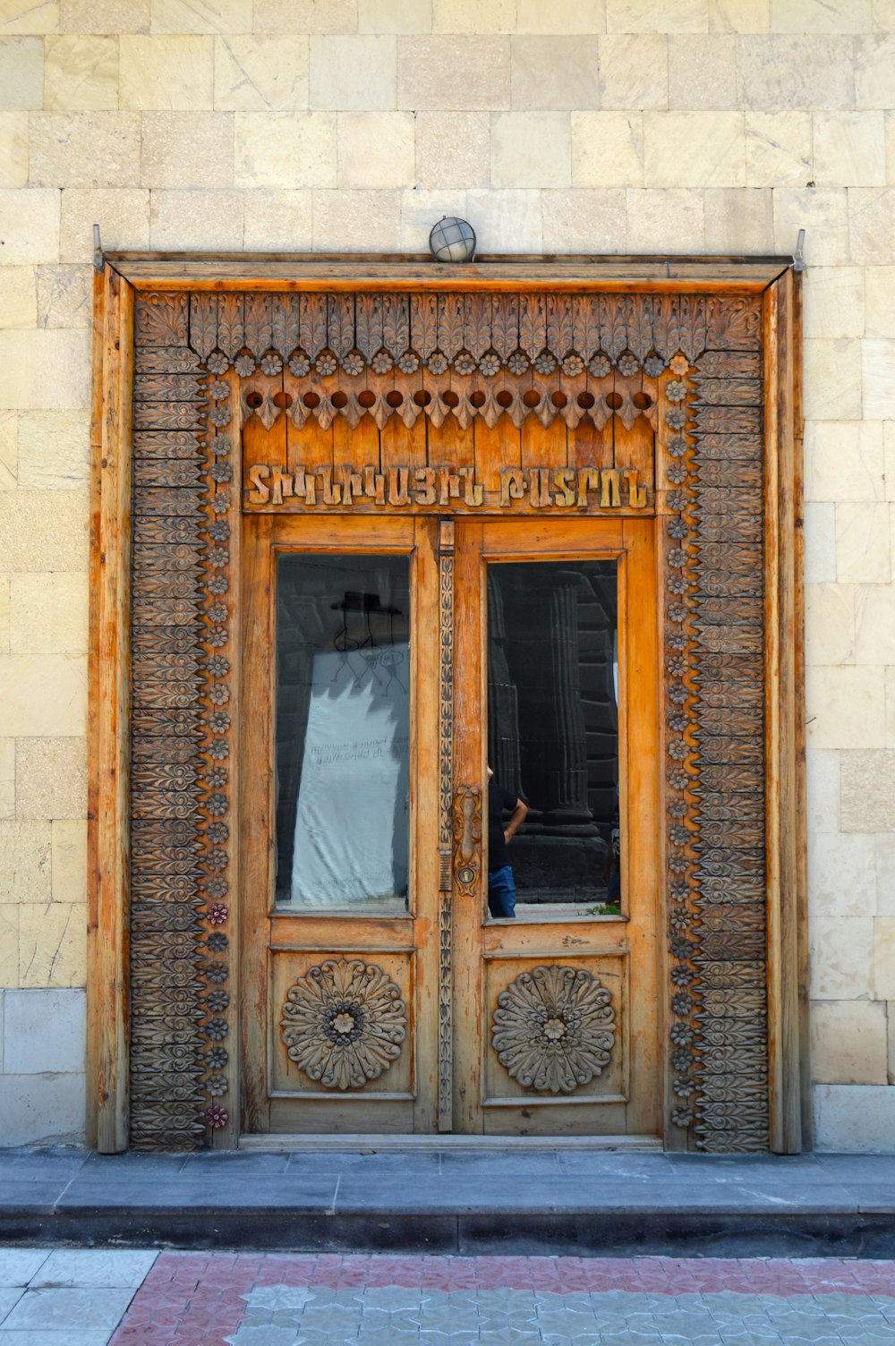 brown wooden door with glass