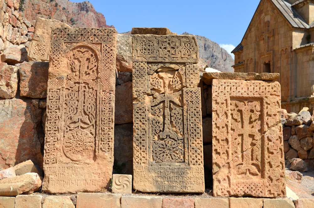 brown concrete statues during daytime