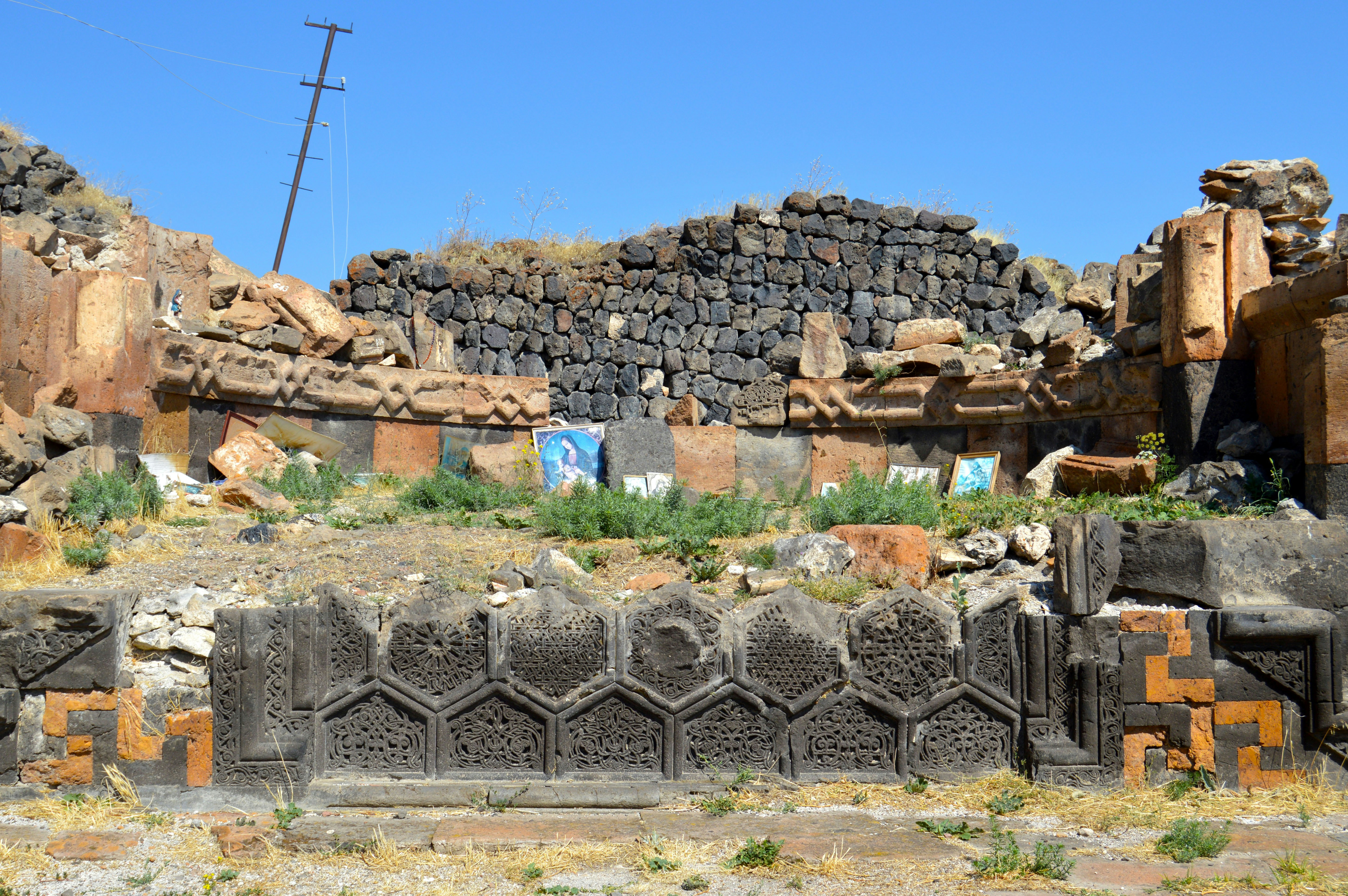 brown brick wall under blue sky during daytime