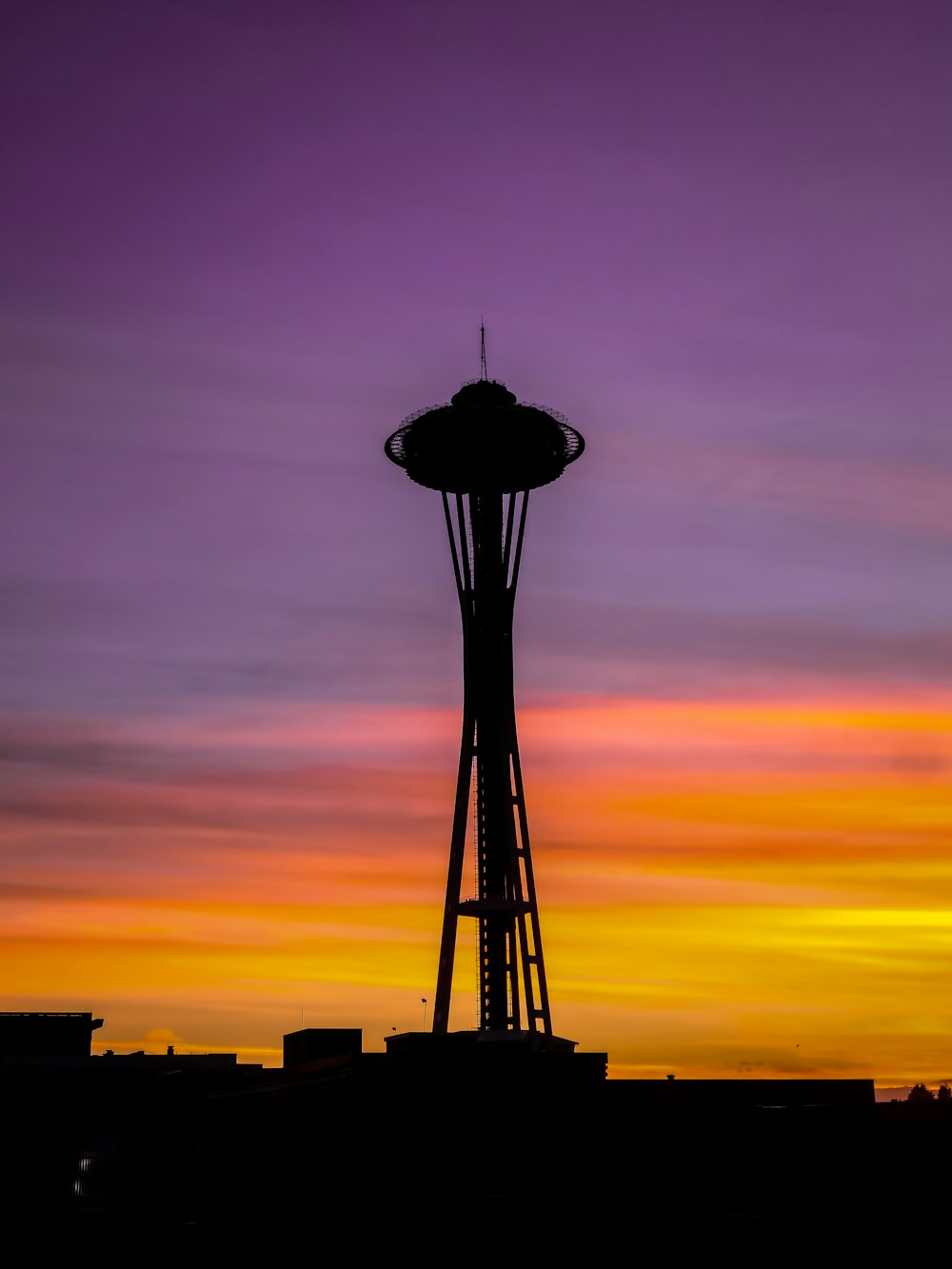 silhouette of tower during sunset