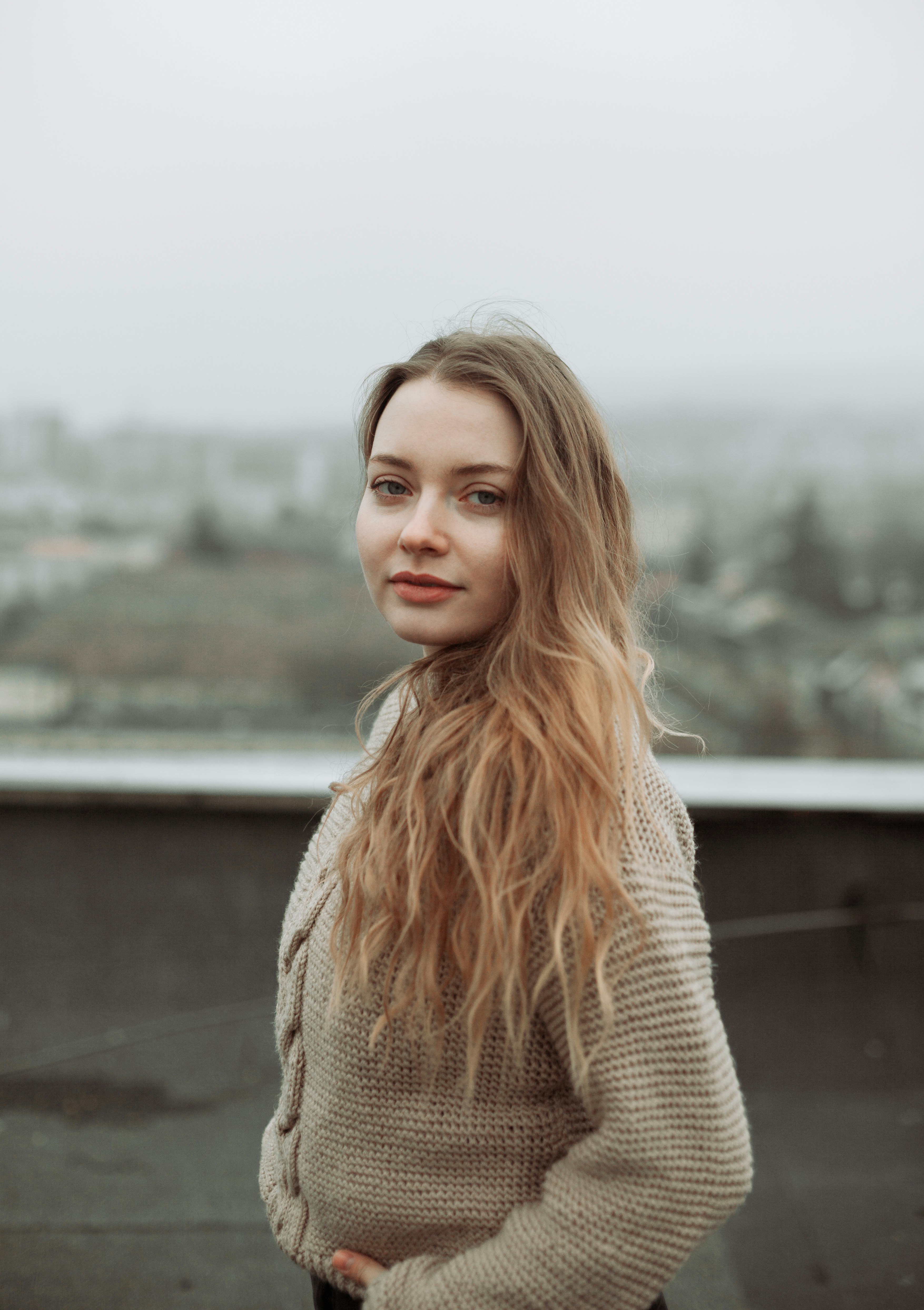 woman in white knit sweater