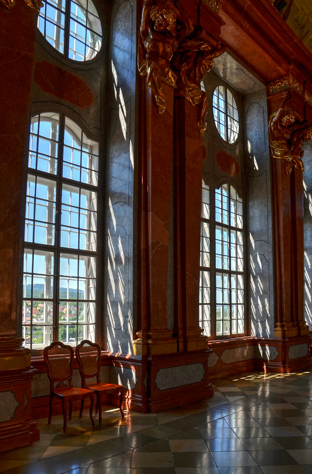 brown wooden chairs and table inside building