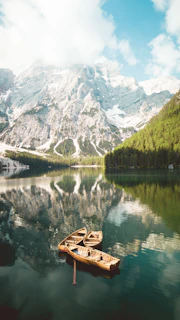 The serene waters of Lake Titicaca with floating reed islands and local fishermen in boats.