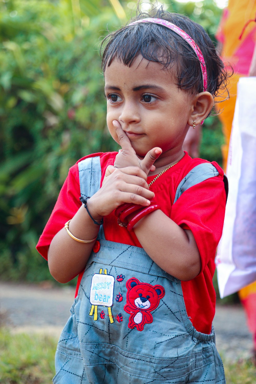 girl in red and white shirt