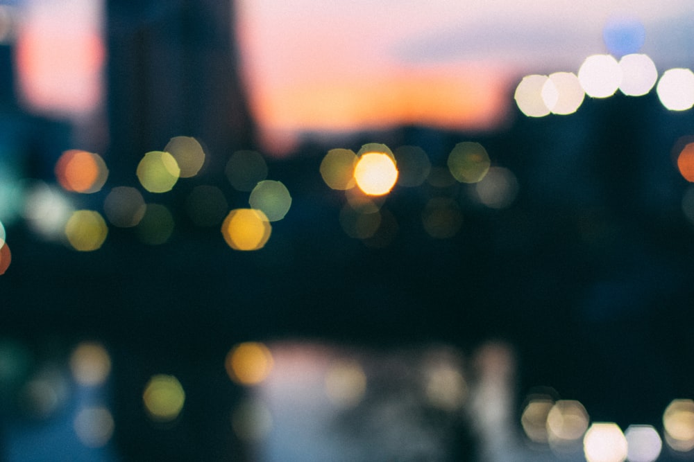 bokeh photography of city lights during night time