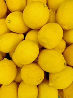 yellow lemon fruit in close up photography