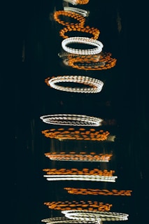 silver and diamond ring on black textile