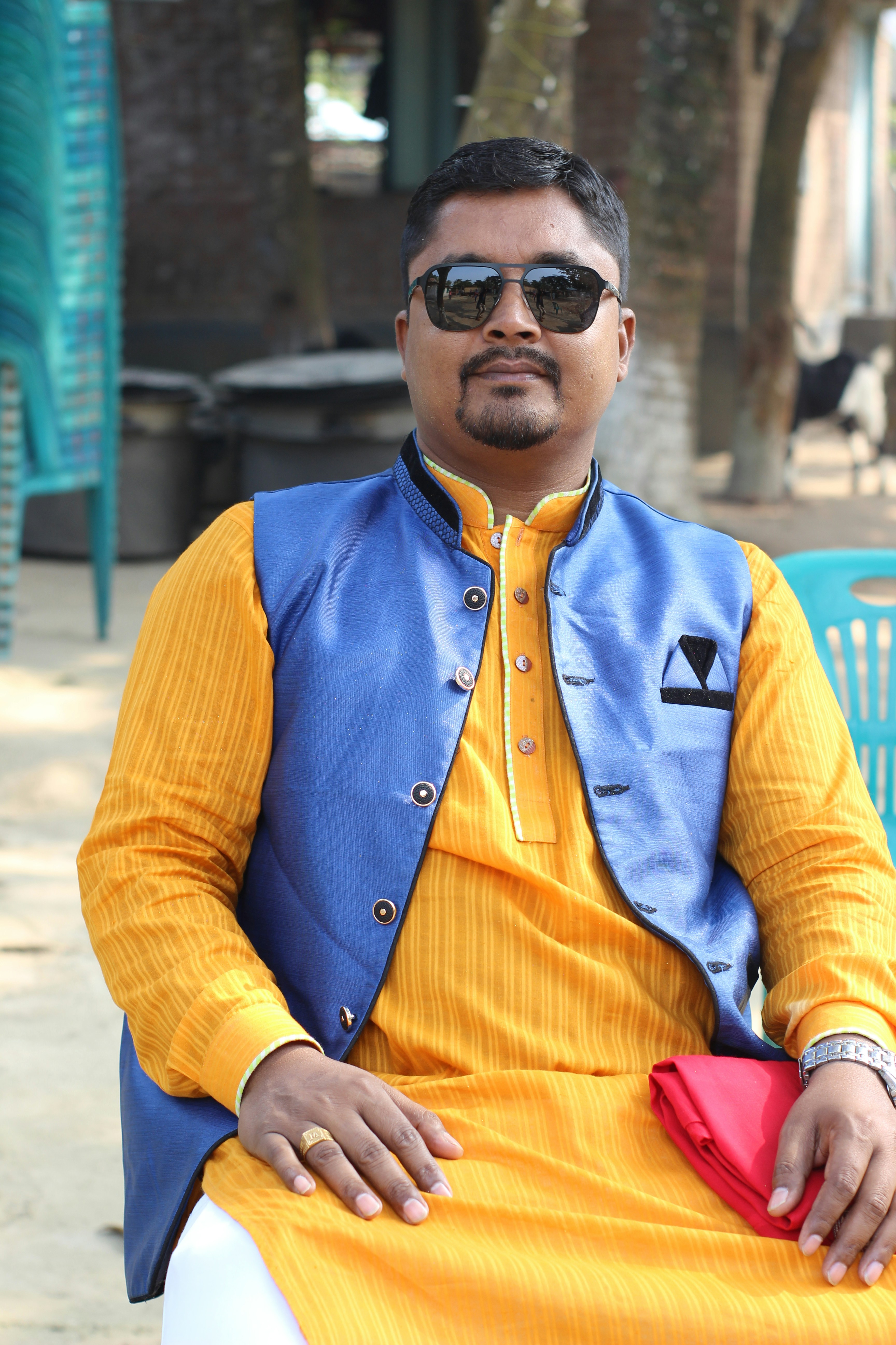 Man in ivory Khadi kurta, clean bright background, relaxed confident pose, traditional Indian casual wear