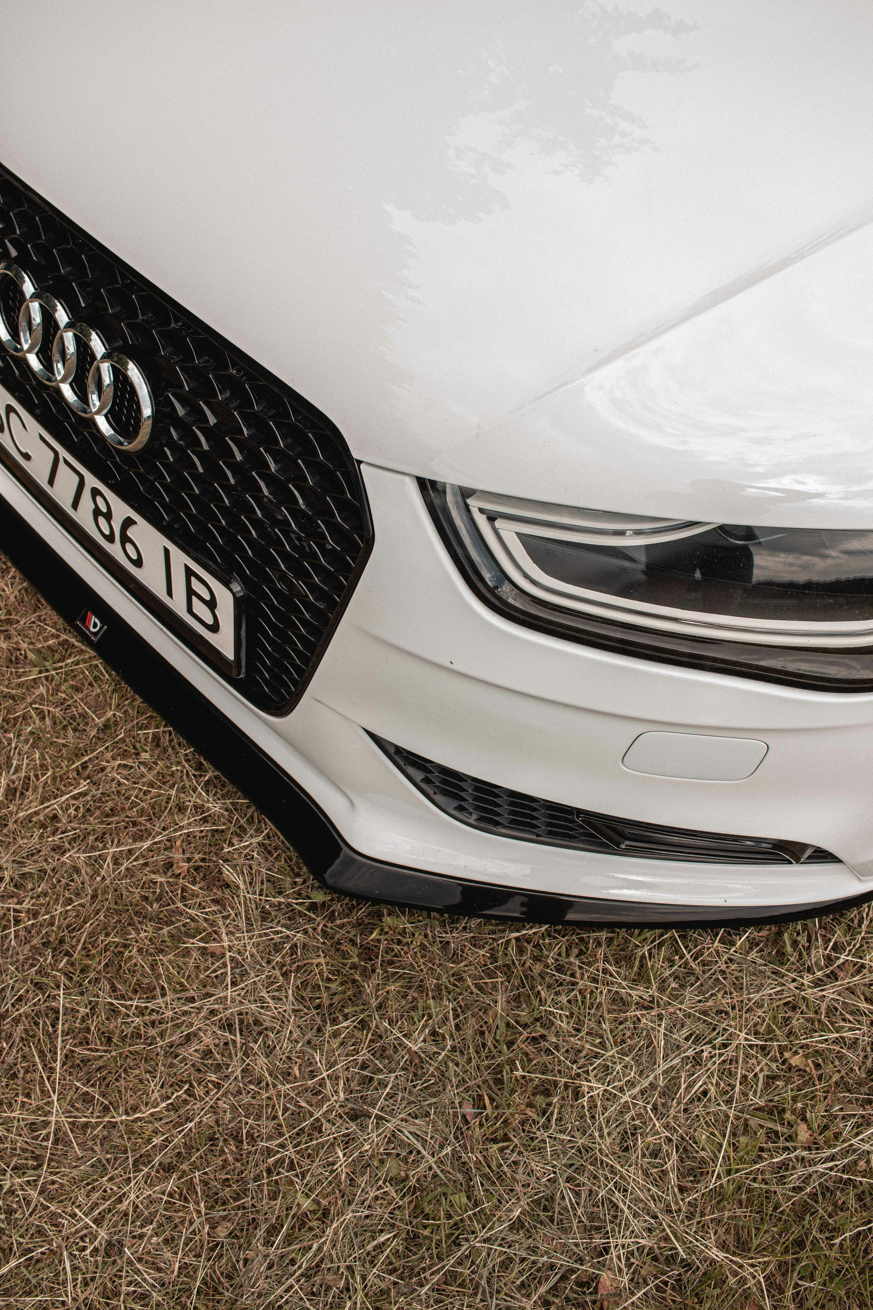 white and black nissan car