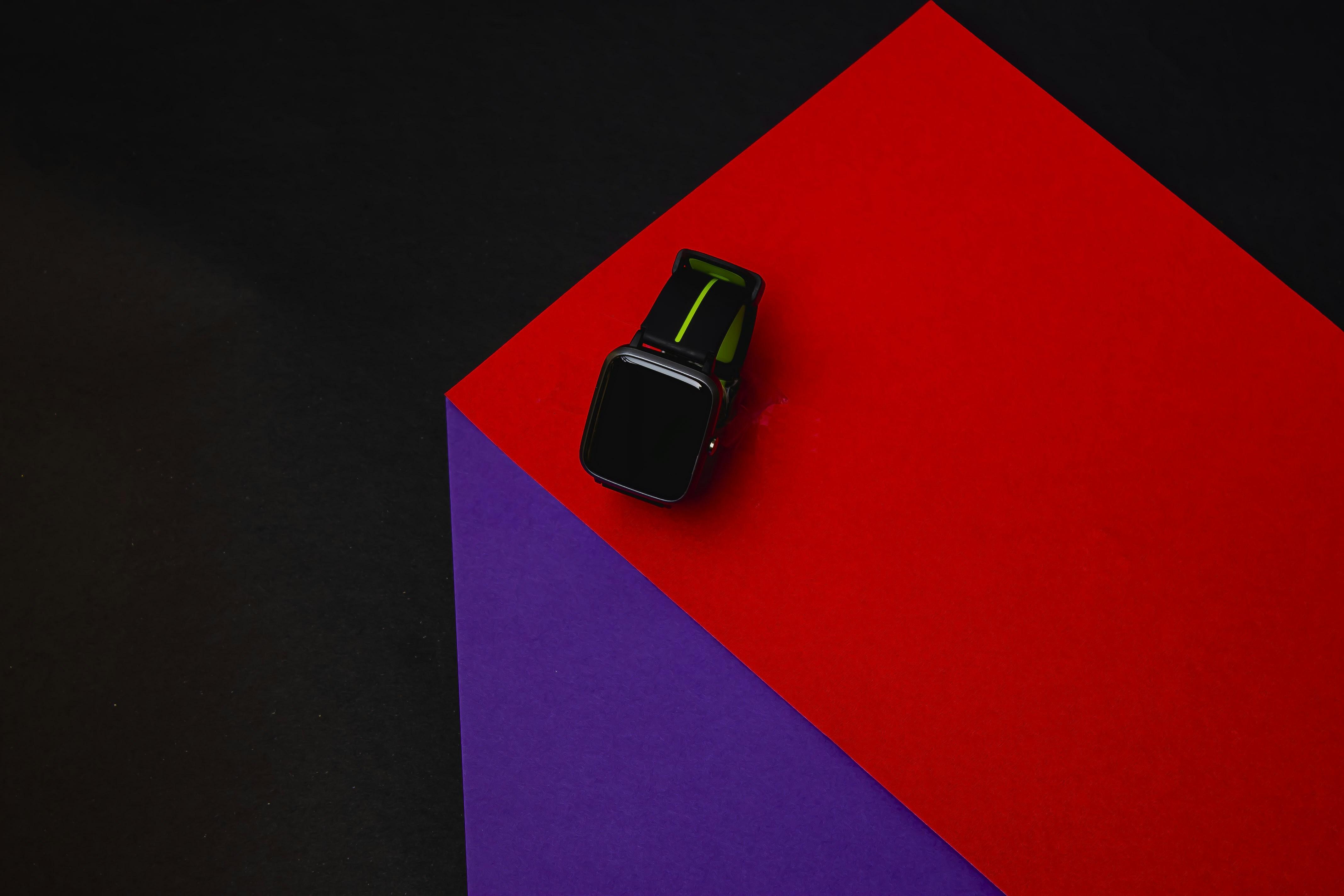 black and silver ring on red surface