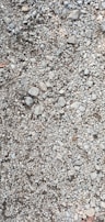 Close-up of crushed basalt stones ready for cement and road metal production.