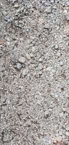 Close-up of crushed stone and gravel ready for construction use.
