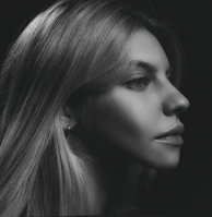 An elegant black and white portrait sketch showcasing delicate shading.