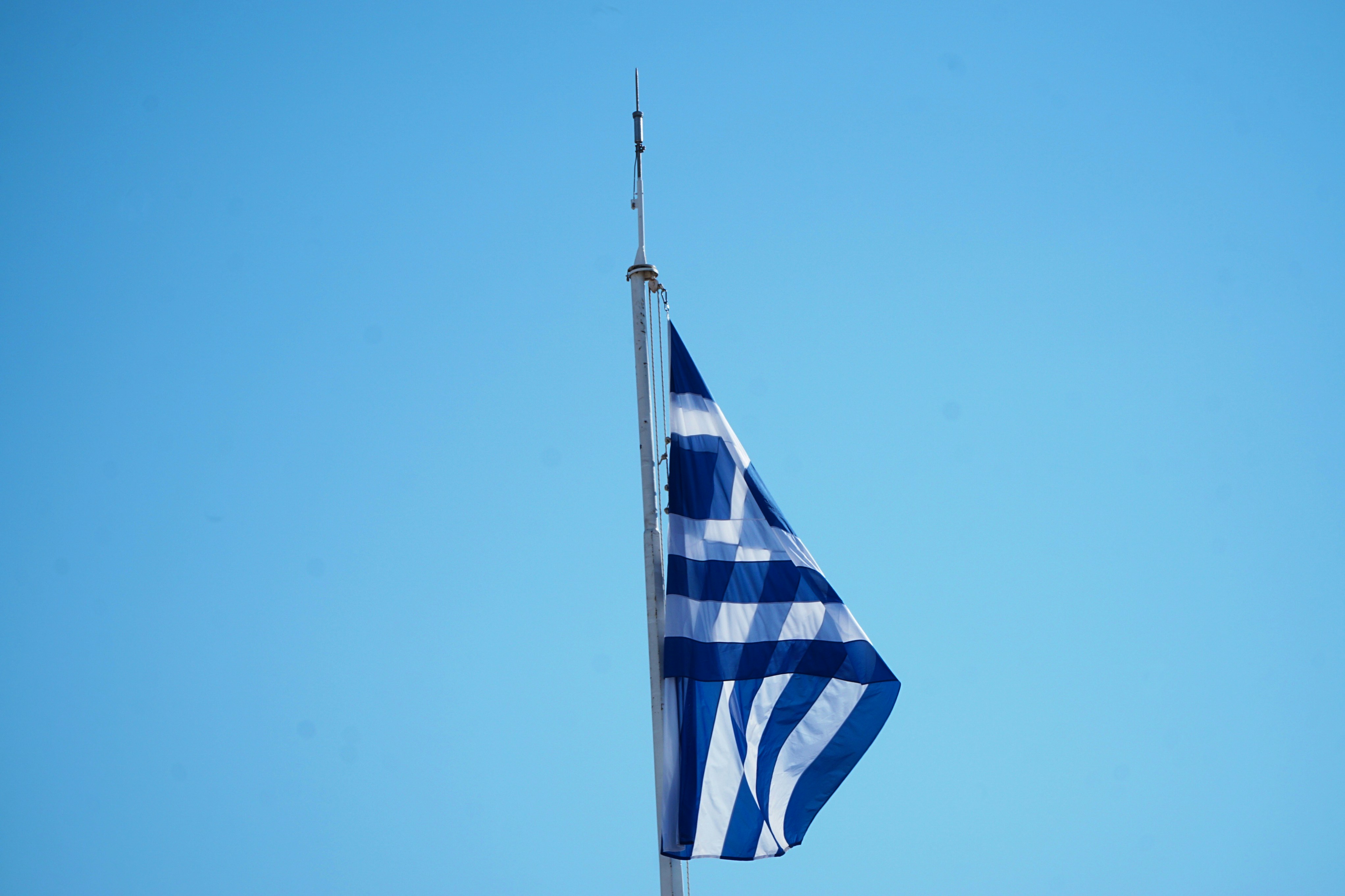 Blue and white striped flag photo - Free Blue sky Image on Unsplash