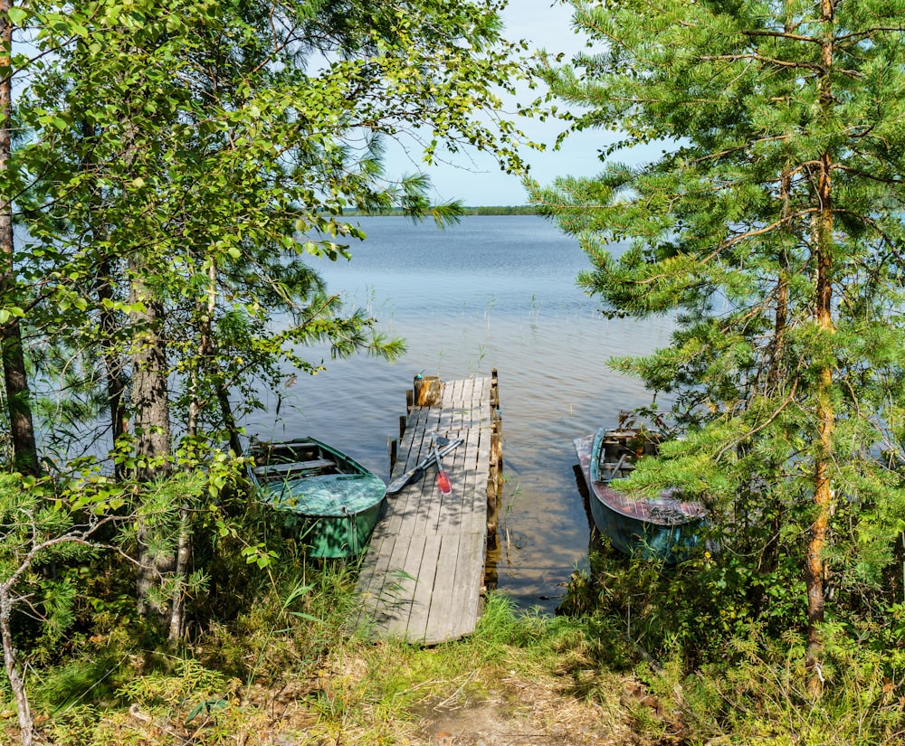 brown wooden boat on body of water during daytime