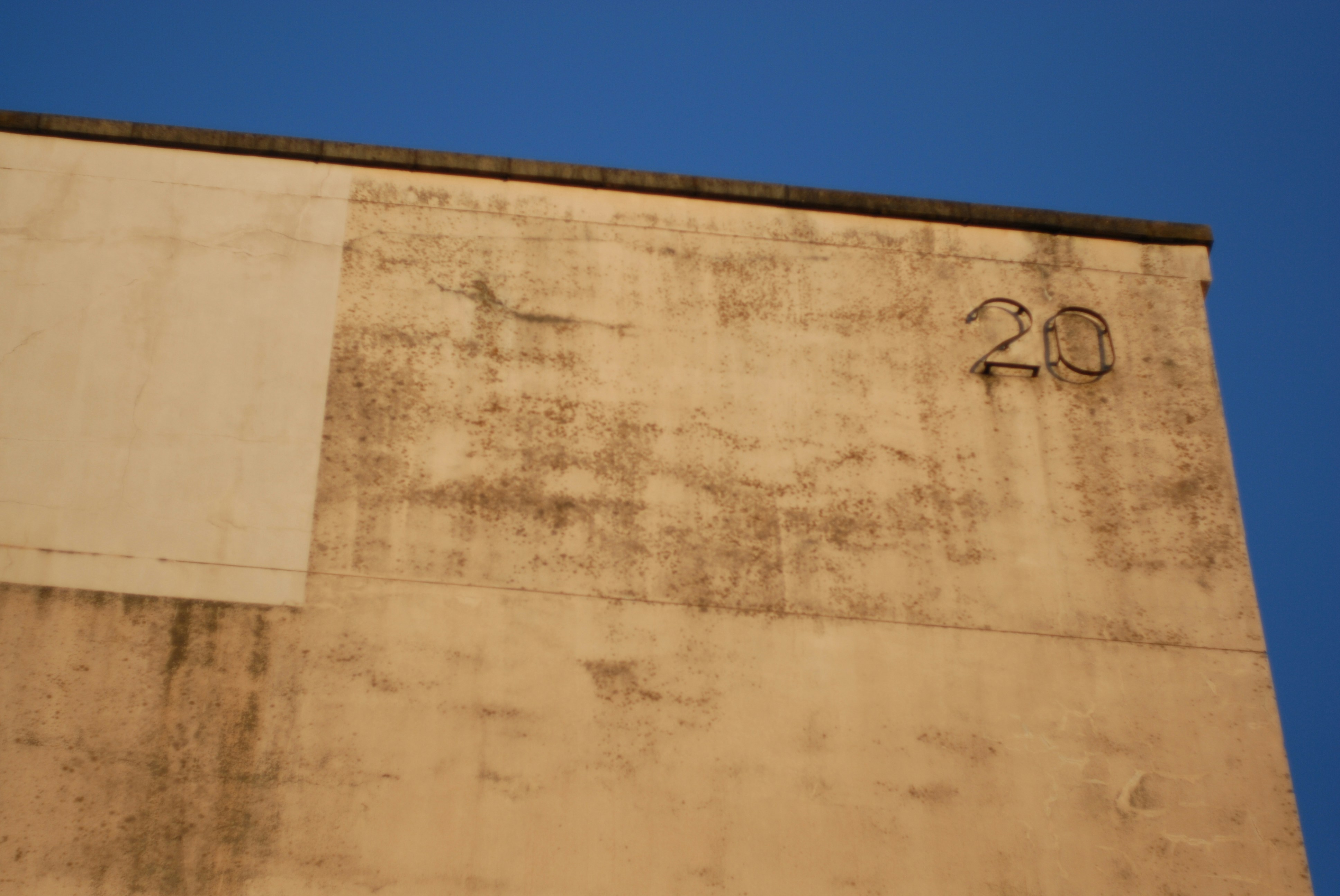 brown concrete building under blue sky during daytime