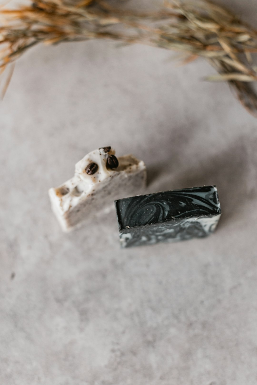 silver ring on white and gray marble table