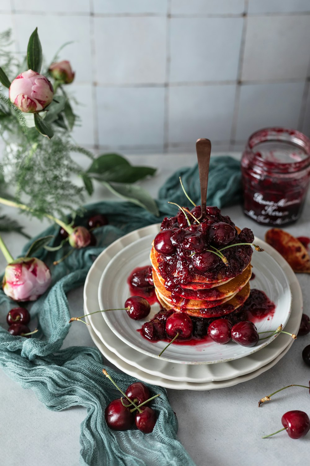 red and brown cake on white ceramic plate