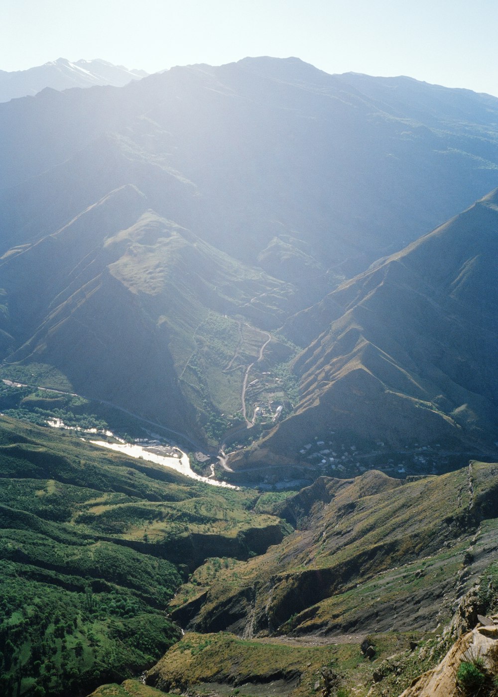 green and black mountains under blue sky during daytime