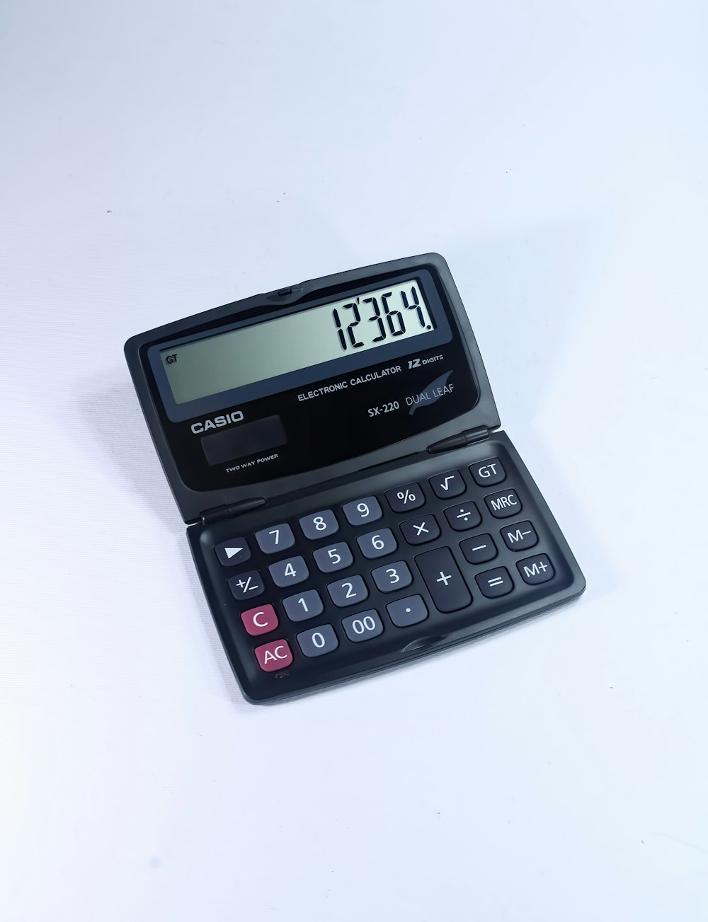 black casio calculator at 0
