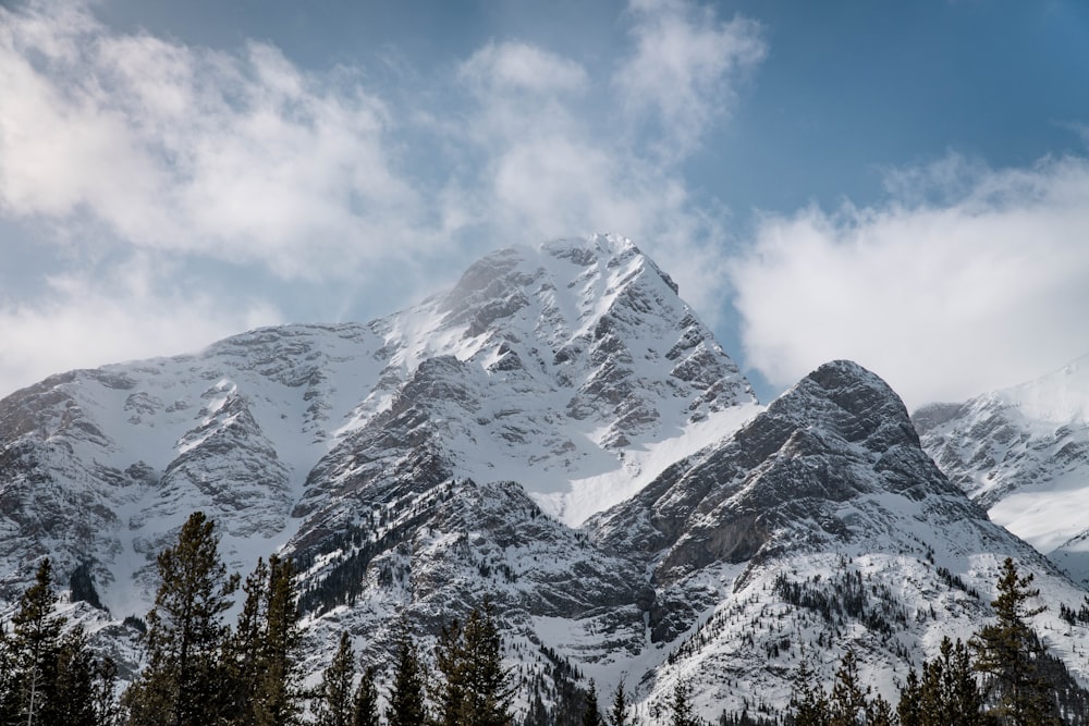 snow covered mountain under blue sky during daytime