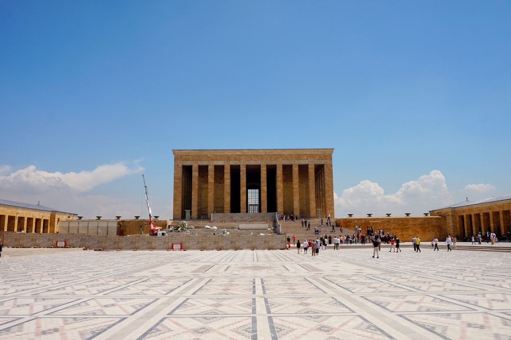 people walking on white concrete floor during daytime