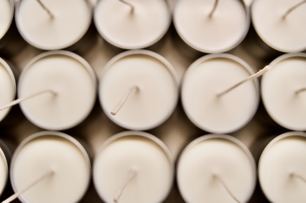 Close-up of cotton candle wicks ready for assembly.
