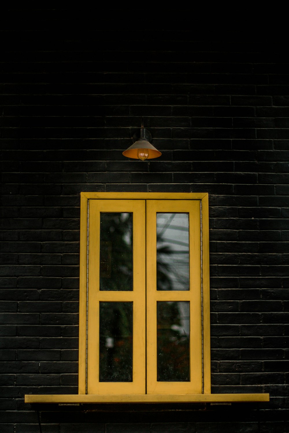 white wooden framed glass window