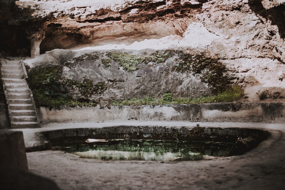 water flowing on brown rock