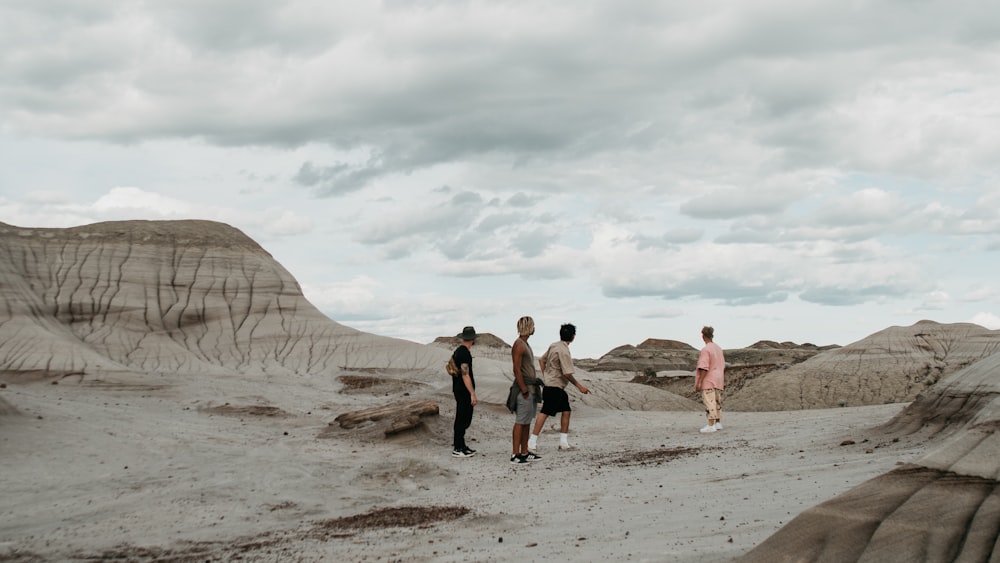 people walking on beach during daytime