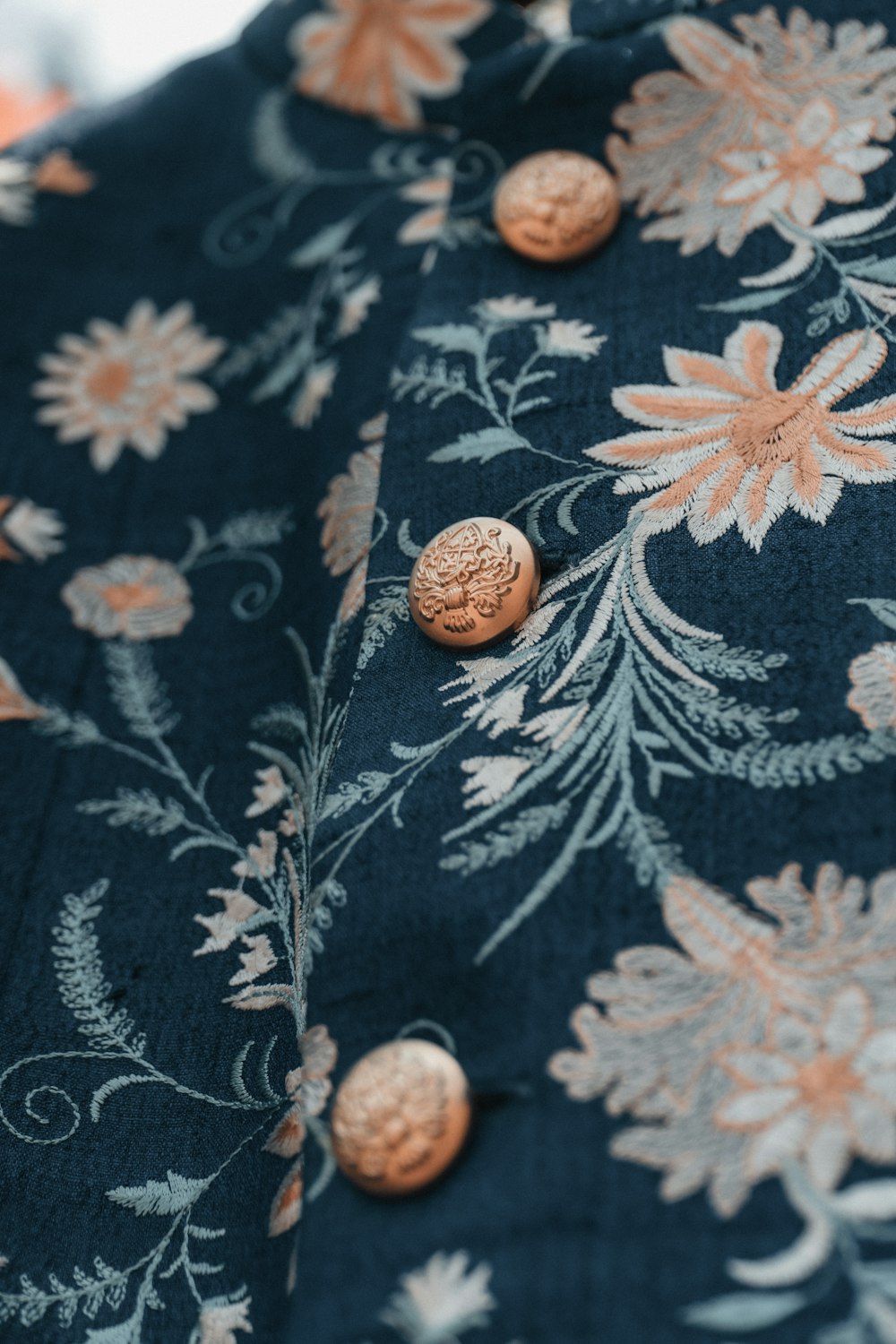brown and black floral textile