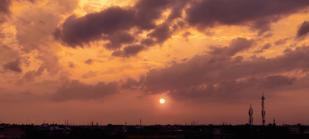 silhouette of buildings during sunset